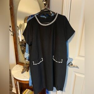 Elegant Black Dress with Pearl Accents